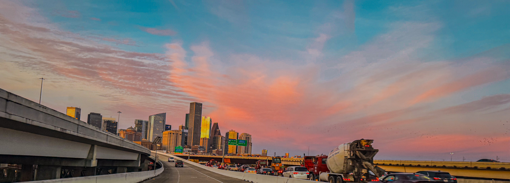 Houston skyline at sunset from the freeway