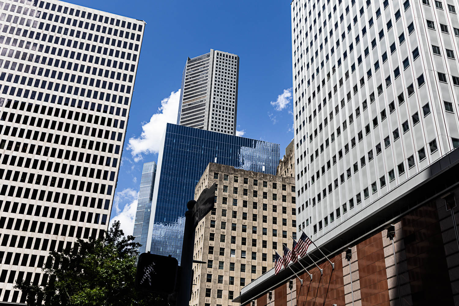 Downtown Houston buildings against a blue sky
