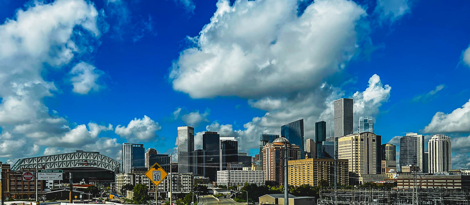Houston skyline under a blue sky